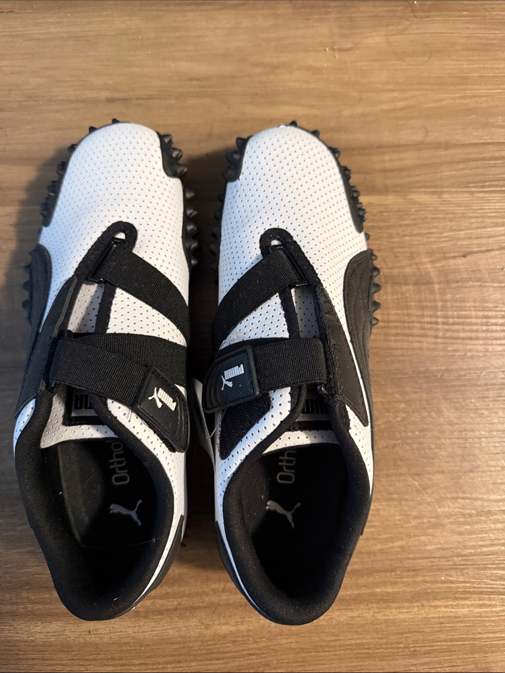 Puma White and Black Slip-On Athletic Sneakers